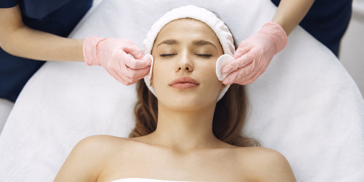 Centered view of a client receiving facial skincare